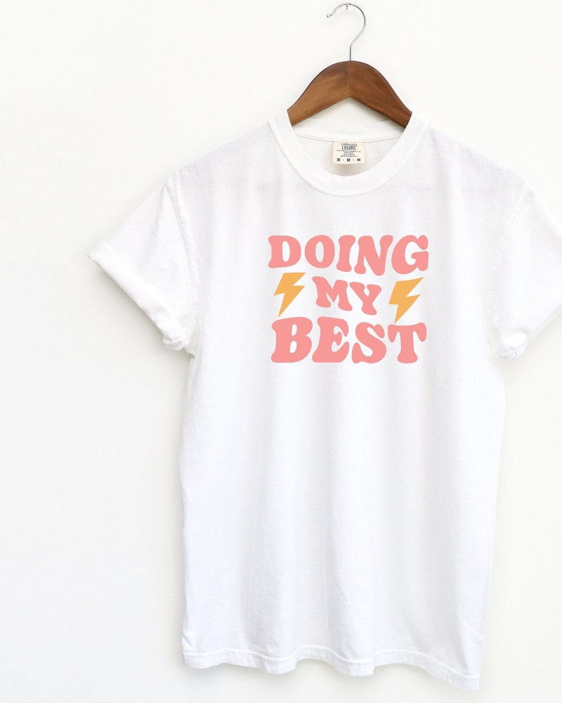 Front of a size 2XL Doing My Best Lightning in White by Simply Sage Market. | dia_product_style_image_id:281477